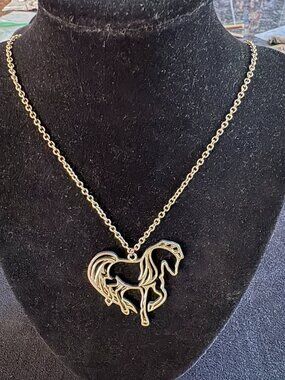 Gold horse necklace